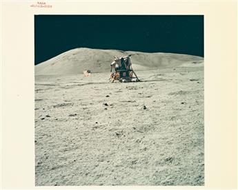 (NASA) Group of 24 color photographs, including the iconic image by Neil Armstrong of Buzz Aldrin walking on the moon, the Earthrise, a